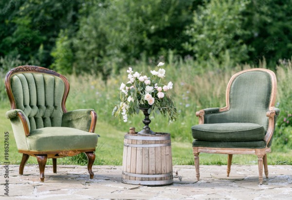 Wunschmotiv: Vintage wood chairs and table with flower decoration in garden. outdoor #198527635